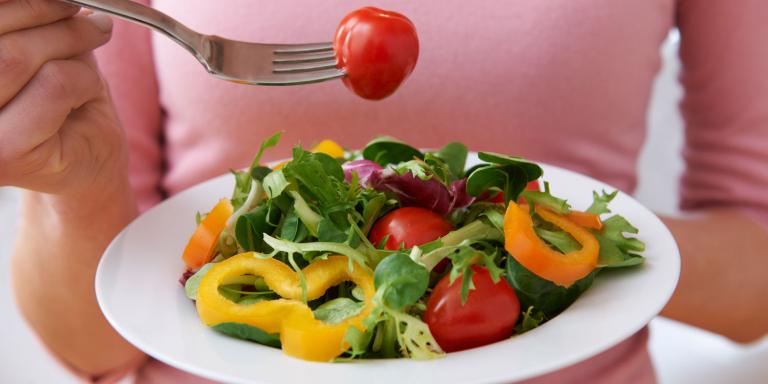 woman eating healthy salad