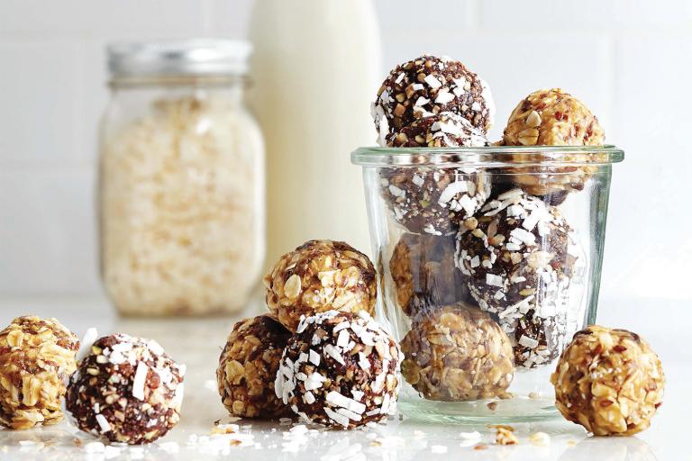 A jar of chocolate snack balls